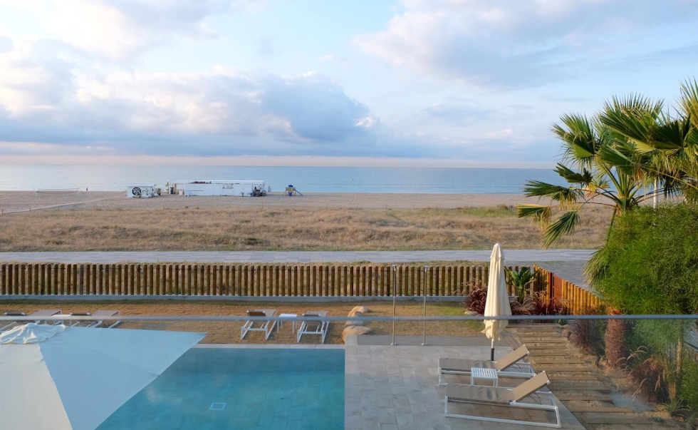 Sunny coworking lounge and terrace near the beach