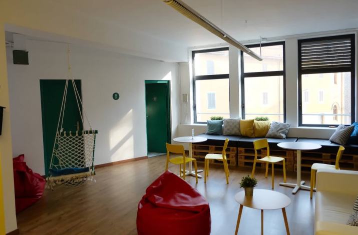 Freelancers collaborating in a bright shared Barcelona office